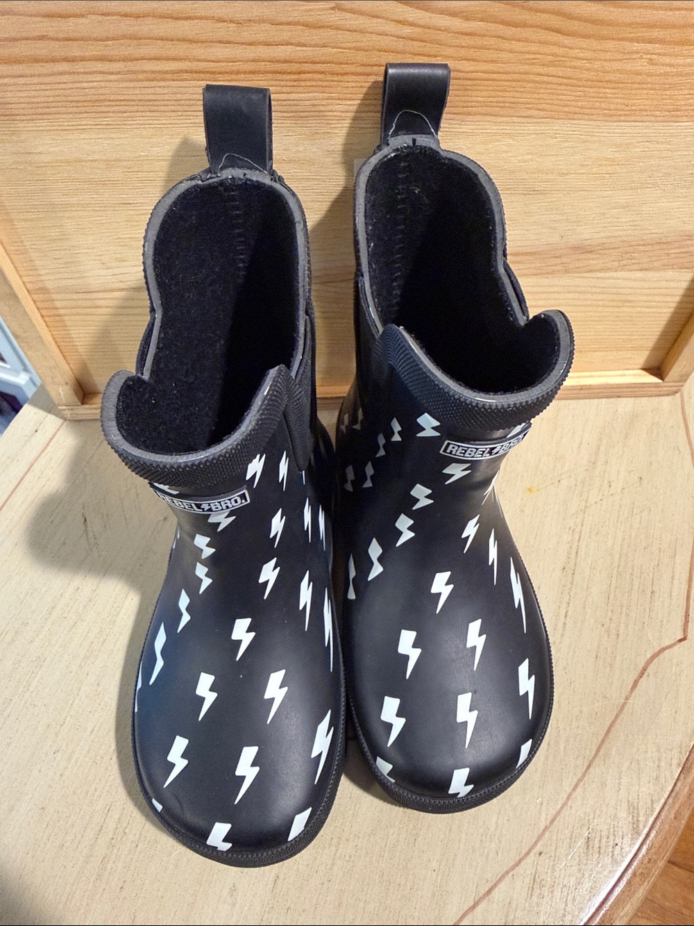 rebels Black Rain Boots with White Lightning Bolts